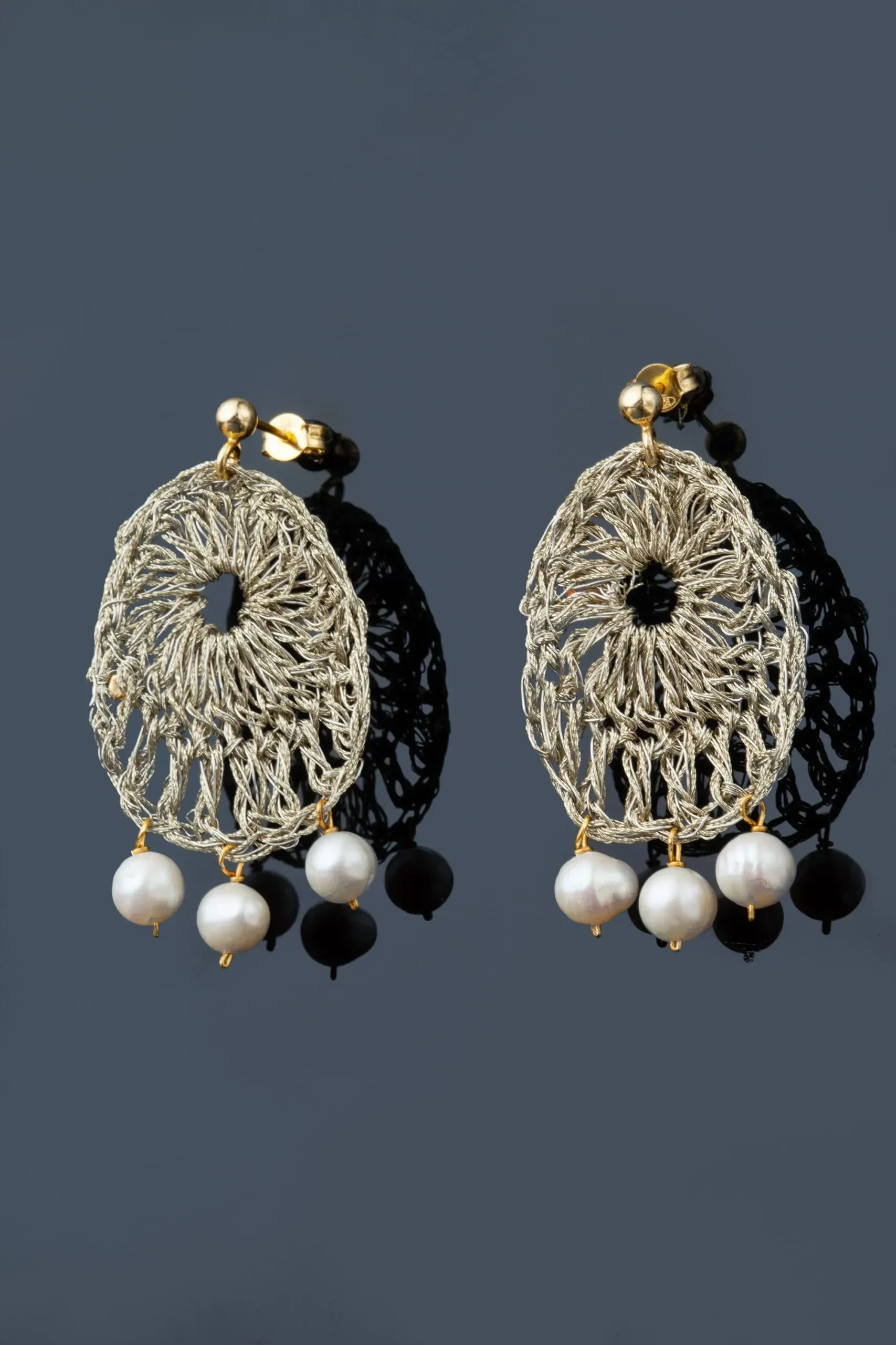 Handmade Jewellery | Crochet knit silver earrings with golden threads and pearls gallery 1