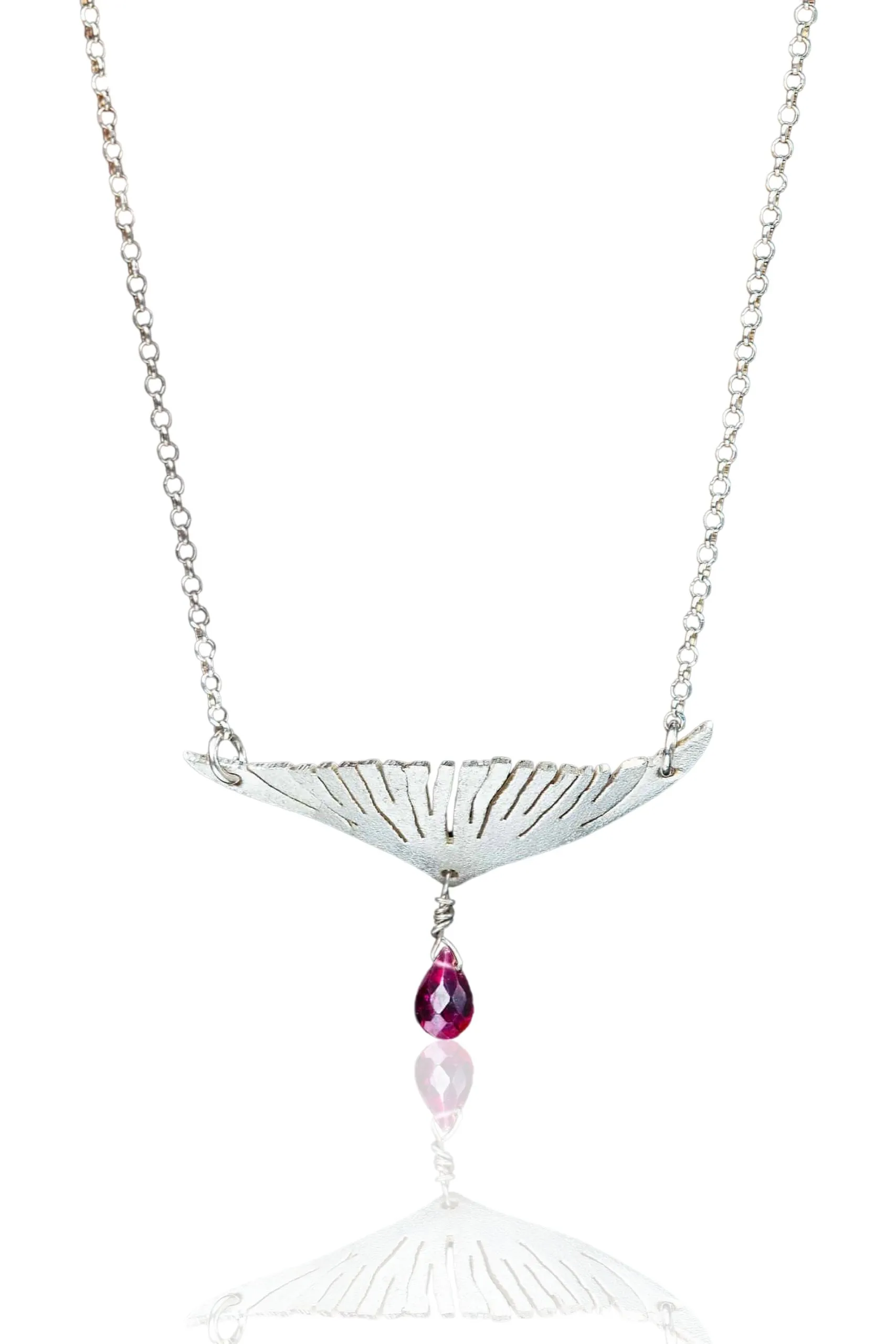 Handmade Jewellery | Wing rhodium plated silver necklace with garnet main